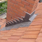 Stepped chimney flashing and back gutter